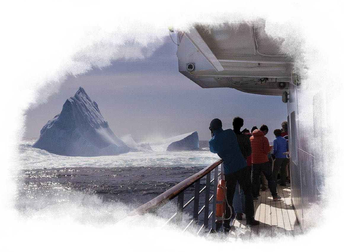 Passengers look at the icebergs in the distance from the ship.
